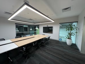 Innovation Lab long meeting table overlooking the ARRB labs